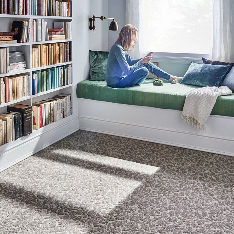 person reading in window - The Carpet Shoppe Inc in Tulare, CA