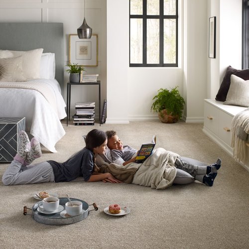 Kids reading on bedroom carpet from The Carpet Shoppe Inc in Tulare, CA