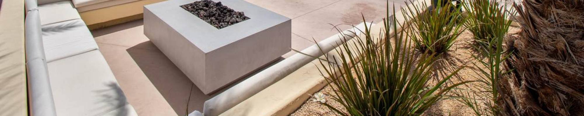 Woman choosing new flooring in the store - The Carpet Shoppe Inc in Tulare, CA