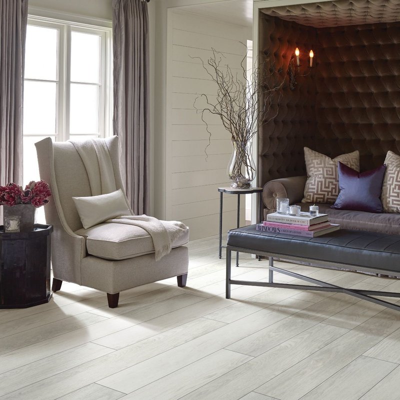 Elegant living room with wood-look luxury vinyl flooring from The Carpet Shoppe Inc in Tulare, CA