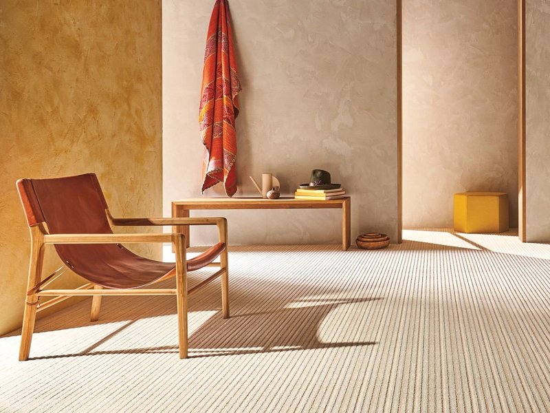 Warm living space with beige textured carpet from The Carpet Shoppe Inc in Tulare, CA
